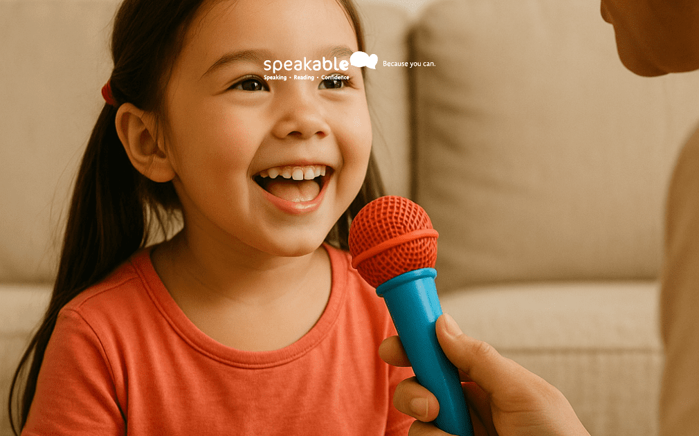 Child practicing speech sounds during play with a parent using a toy microphone.
