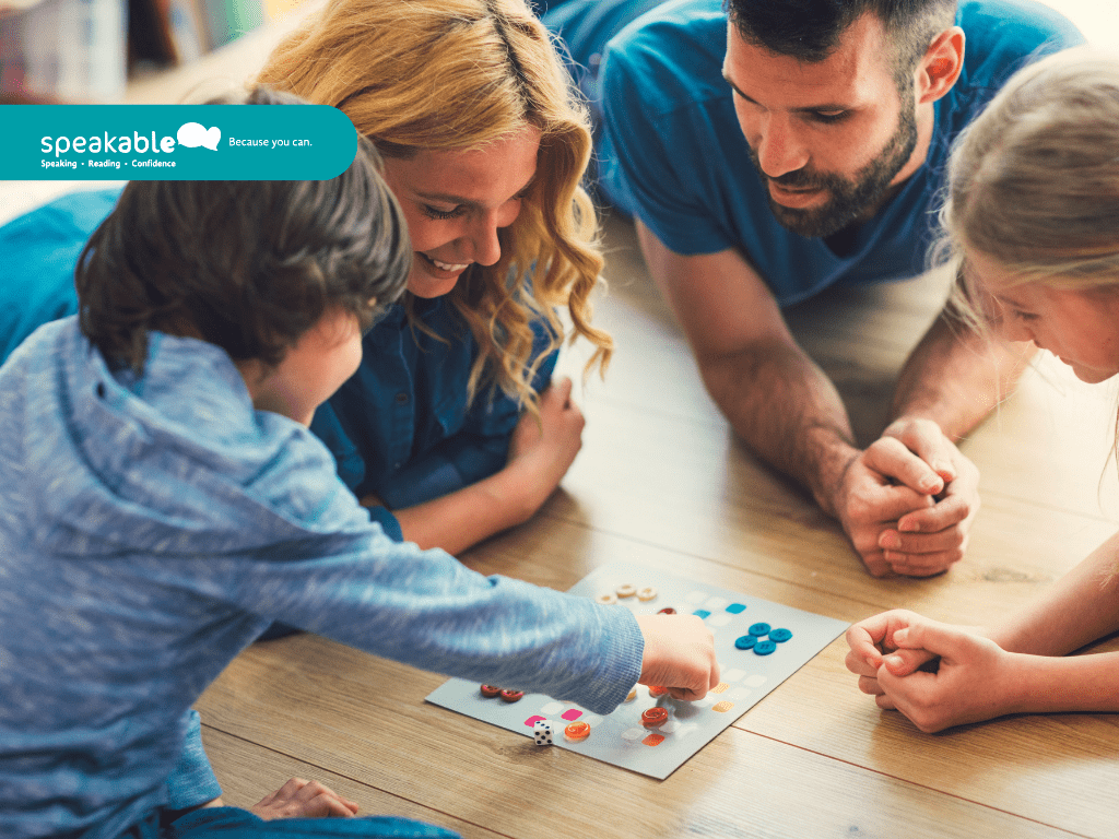 Family playing together while learning new words through fun activities.