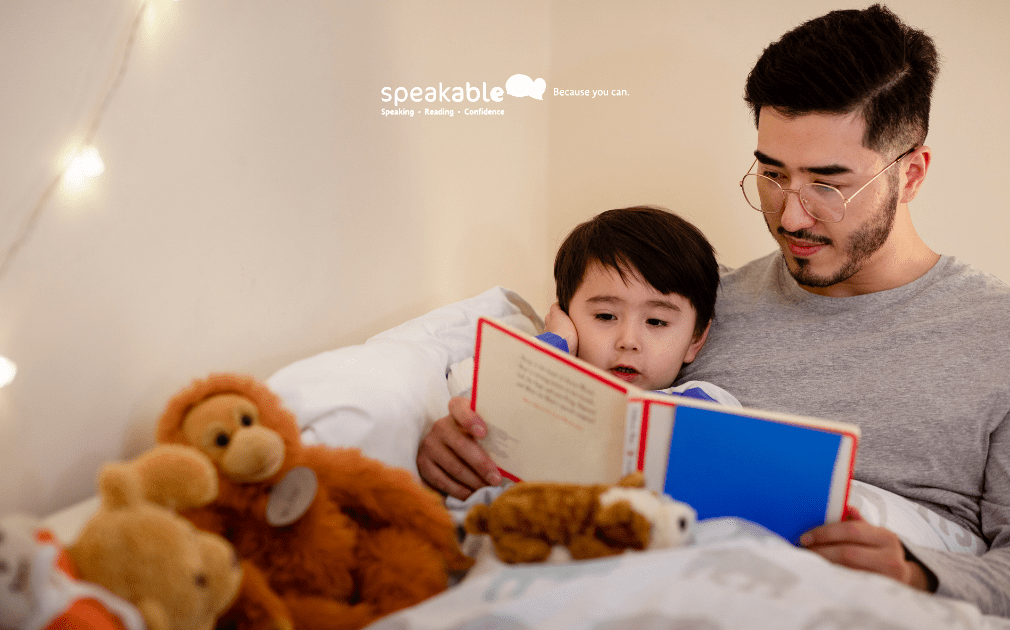 Parent reading a bedtime story with a child who listens attentively.