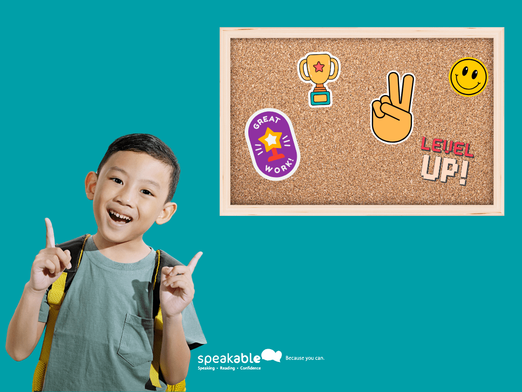 Child adding stickers to a progress chart at home.