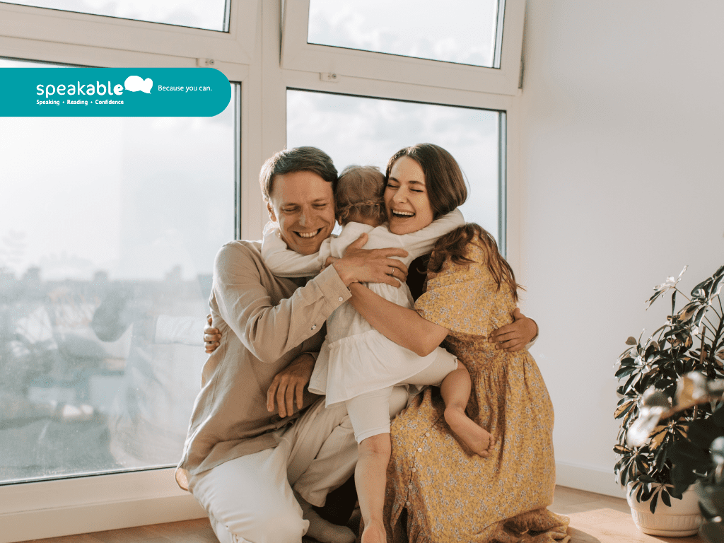 Parent hugging their child after recognising progress in speech and confidence.