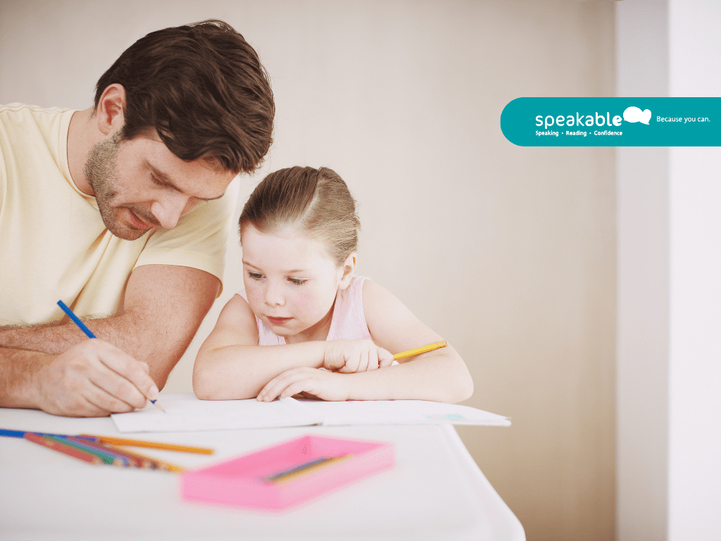 Parent supporting a child to organise school tasks using a visual planner.