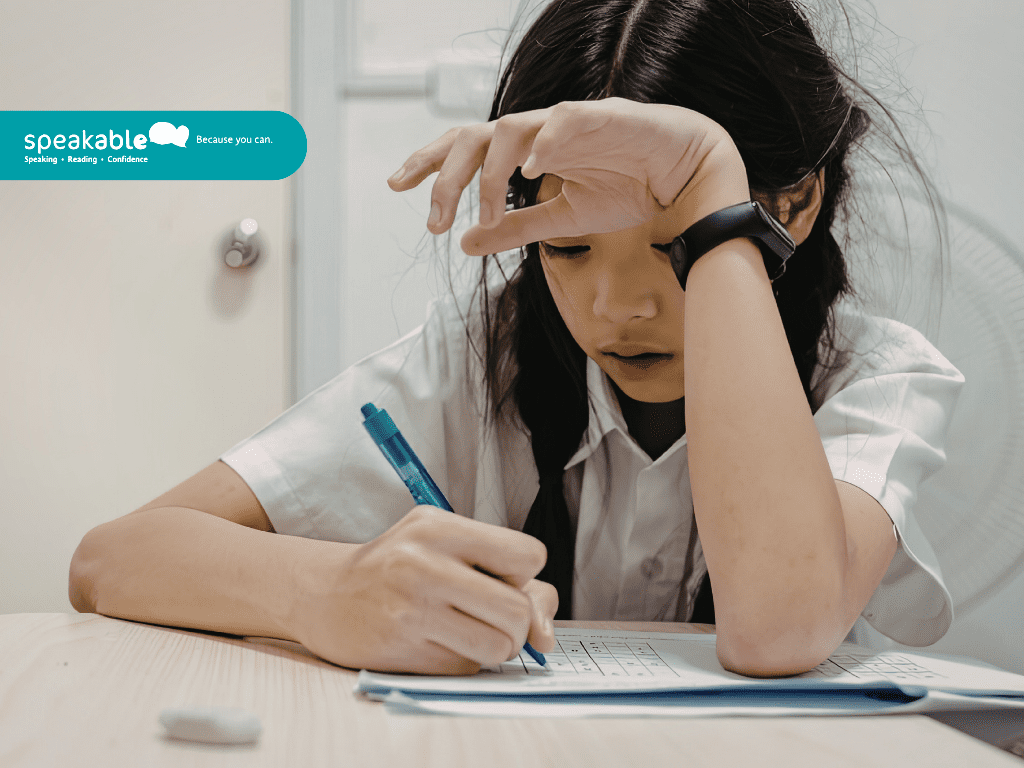 Child concentrating while thinking and learning during a quiet activity.