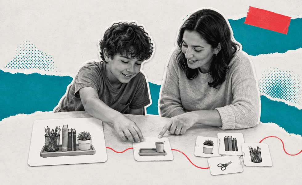 Adult helping a child identify the first step of a task using visual support.